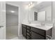 Bathroom with vanity and mirror next to an open door at 514 Purple Finch Rd, Summerville, SC 29486
