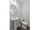 Half bathroom featuring pedestal sink and modern toilet at 514 Purple Finch Rd, Summerville, SC 29486
