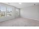 Carpeted bedroom with neutral paint, large windows and plenty of natural light at 514 Purple Finch Rd, Summerville, SC 29486