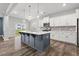 Stylish kitchen with an island, pendant lighting, stainless steel appliances, and modern finishes at 514 Purple Finch Rd, Summerville, SC 29486