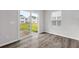 Bright and modern living room with sliding glass doors to an outdoor area at 514 Purple Finch Rd, Summerville, SC 29486