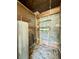 Utility room showcasing shelves and a water heater at 524 Kell Pl, Charleston, SC 29412