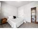 Neutral bedroom with a closet, side table, and plush carpet flooring at 582 Mclernon Trce, Johns Island, SC 29455