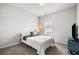Bright bedroom featuring cozy decor, a window view, and a plush carpet at 582 Mclernon Trce, Johns Island, SC 29455