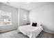 Cozy bedroom with a large window, soft carpet, and minimalist decor at 582 Mclernon Trce, Johns Island, SC 29455