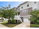 Charming townhome with a white picket fence, attached garage and lush landscaping at 582 Mclernon Trce, Johns Island, SC 29455