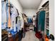 Spacious walk-in closet with ample storage and clothing racks at 582 Mclernon Trce, Johns Island, SC 29455