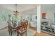 Elegant dining area featuring hardwood floors, with ample room for a large gathering at 5847 Back Bay Dr, Isle of Palms, SC 29451
