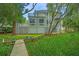 Back of house featuring multilevel deck/balconies and lush greenery at 5847 Back Bay Dr, Isle of Palms, SC 29451