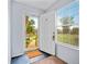 Inviting entryway featuring a white door, tile floors, and a window with blinds at 6231 Rolling Fork Rd # 1201-A, North Charleston, SC 29406