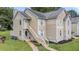 Charming home featuring two stories, with a stairway to the upper-level entrance at 6231 Rolling Fork Rd # 1201-A, North Charleston, SC 29406