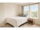 Cozy bedroom with natural light, neutral tones, and comfortable furnishings for a peaceful retreat at 69 Red Bluff St, Summerville, SC 29483