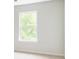 Bright bedroom with a large window offering views of the outdoors and soft carpet flooring at 69 Red Bluff St, Summerville, SC 29483