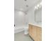 Bathroom featuring a marble top vanity, hexagon tile floor, and shower with white subway tile at 7053 Schooner St, Daniel Island, SC 29492