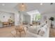 Open floor plan living area with bright white shiplap walls and cozy seating at 7053 Schooner St, Daniel Island, SC 29492
