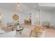 Spacious living room with hardwood floors, modern lighting, and comfortable seating at 7053 Schooner St, Daniel Island, SC 29492