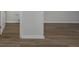 Bathroom featuring wood-look flooring, white walls, and neutral trims at 758 Meadowbrook Lane, Summerville, SC 29486