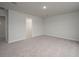 Large primary bedroom showing carpeted floor, neutral wall color, and ample walking space at 758 Meadowbrook Lane, Summerville, SC 29486