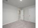 Spacious bedroom with neutral carpet, doorway, and a closet for ample storage space at 758 Meadowbrook Lane, Summerville, SC 29486