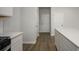 Hallway between kitchen and exterior door has luxury vinyl plank flooring at 758 Meadowbrook Lane, Summerville, SC 29486