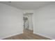 Spacious hallway with wood-look flooring, neutral walls, and views of the staircase, enhancing the home's flow at 758 Meadowbrook Lane, Summerville, SC 29486