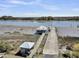 Aerial shot of private dock featuring a covered area, perfect for waterfront living at 7878 Gull Bay Dr, Awendaw, SC 29429
