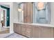 Bathroom featuring double vanity sinks and light pendants at 7878 Gull Bay Dr, Awendaw, SC 29429