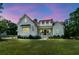 Charming home with inviting front porch under evening sky at 7878 Gull Bay Dr, Awendaw, SC 29429