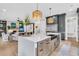 Spacious kitchen with modern appliances, island, and open floor plan at 7878 Gull Bay Dr, Awendaw, SC 29429