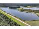 Beautiful lake view surrounded by lush green forest at 7878 Gull Bay Dr, Awendaw, SC 29429