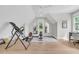 Bright workout room featuring exercise equipment, hardwood floors, and a ceiling fan at 7878 Gull Bay Dr, Awendaw, SC 29429