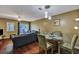 Inviting dining area with hardwood floors and stylish lighting fixture at 7963 Shadow Oak Dr, North Charleston, SC 29406
