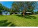 Backyard featuring various storage and garden outbuildings at 806 Appii Rd, Moncks Corner, SC 29461