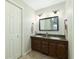 Bathroom featuring double sink vanity with granite countertop and tiled floor at 806 Appii Rd, Moncks Corner, SC 29461
