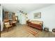 Open-concept living area with wood floors, dining space, and a cozy seating area at 806 Appii Rd, Moncks Corner, SC 29461