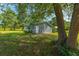 Outbuilding featuring metal siding, a metal roof, and a single entry door at 806 Appii Rd, Moncks Corner, SC 29461