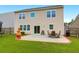Inviting backyard featuring a patio with outdoor seating, perfect for entertaining or relaxing at 9785 Black Willow Ln, Ladson, SC 29456