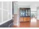 Welcoming foyer with hardwood floors and stairs leading upstairs at 9785 Black Willow Ln, Ladson, SC 29456