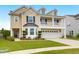 Inviting two-story home with a neat lawn and well-kept landscaping, showcasing curb appeal at 9785 Black Willow Ln, Ladson, SC 29456