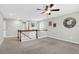 Spacious upstairs landing with carpeted floors at 9785 Black Willow Ln, Ladson, SC 29456