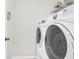 This laundry room has a white washer and dryer at 9785 Black Willow Ln, Ladson, SC 29456