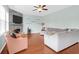 Inviting living room features a fireplace, comfortable seating, and hardwood floors at 9785 Black Willow Ln, Ladson, SC 29456