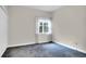 Comfortable bedroom showcasing a window with soft lighting and space to relax at 100 Cheshire Dr, Goose Creek, SC 29445
