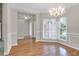 Elegant dining room featuring hardwood floors and a chandelier at 100 Cheshire Dr, Goose Creek, SC 29445