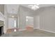 Open-concept living area flowing into the dining room with hardwood flooring and natural light at 100 Cheshire Dr, Goose Creek, SC 29445