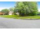 An attractive brick home on a corner lot with mature landscaping at 100 Cheshire Dr, Goose Creek, SC 29445