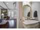 Elegant powder room featuring a marble sink and gold accents at 105 Bobcat Ln, Ravenel, SC 29470