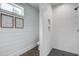 This bathroom has a tiled shower, a wood accent wall with lovely wall decor and a toilet at 105 Bobcat Ln, Ravenel, SC 29470