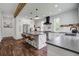 Spacious kitchen with white cabinets, a large island, and stainless steel appliances at 105 Bobcat Ln, Ravenel, SC 29470