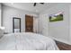 Main bedroom with a sliding barn door and a mounted television at 105 Bobcat Ln, Ravenel, SC 29470
